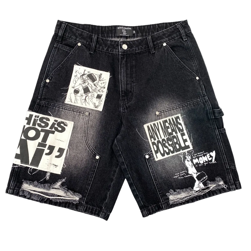 Black washed denim cargo shorts with multiple graphic patches and distressed details, displayed flat against a white background.